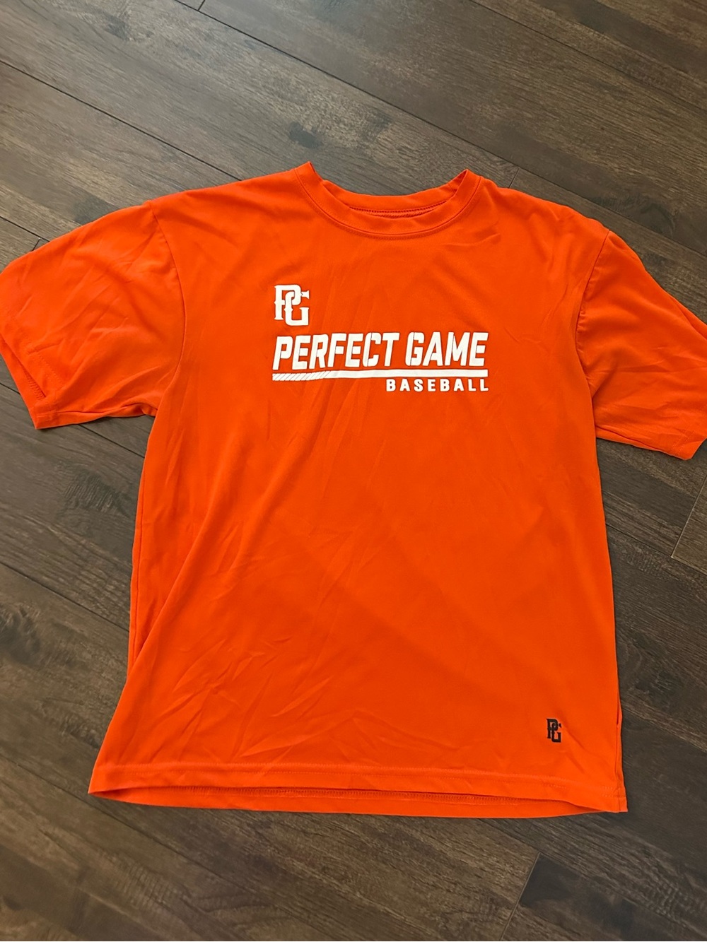 Perfect Game Orange Graphic Tee with Interior Brand Print